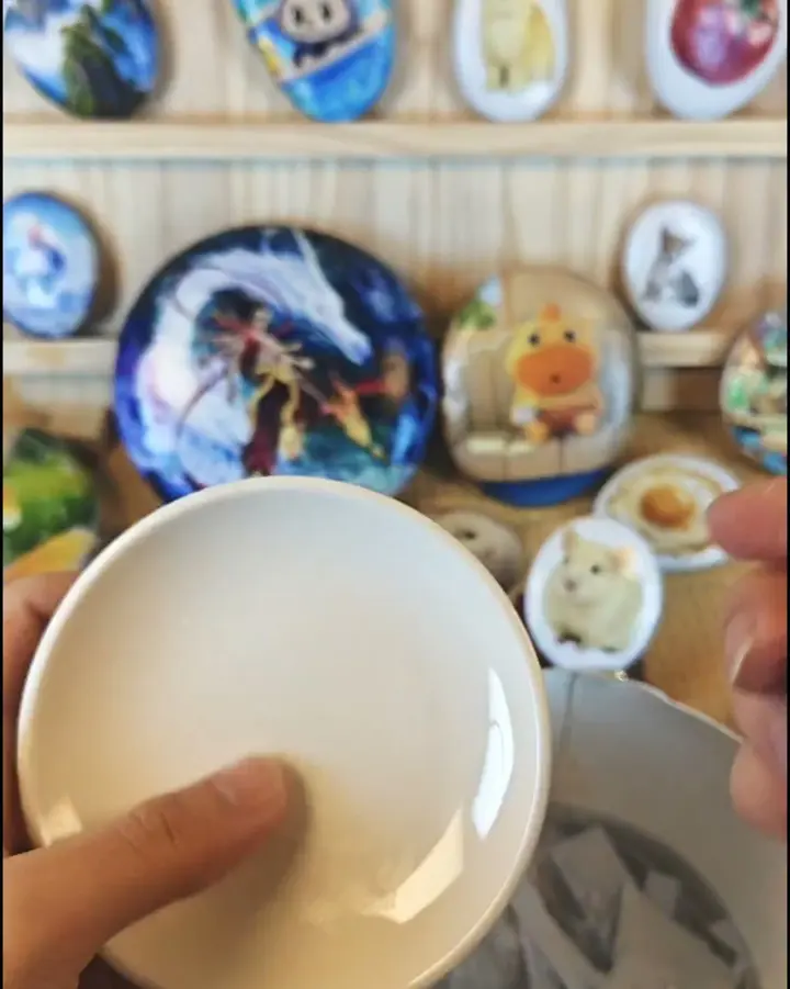 The print being pressed firmly onto the surface